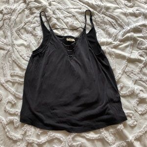 Charcoal grey tank with chains across v-neck